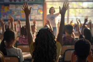 Students With Hands Raised In Classroom photo