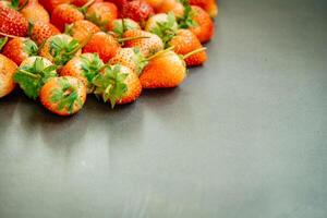 A bunch of strawberries on a table photo