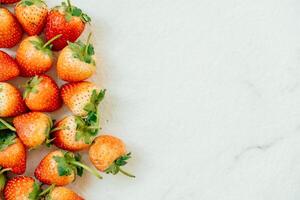 Fresh strawberries on a white background photo