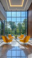 Modern interior with bright yellow chairs under large windows in a spacious lobby photo