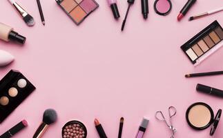 Girlish stuff. Frame of professional cosmetics and brushes around blank space for advertisement photo