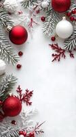 Holiday ornaments and snowflakes on a textured white background in festive colors photo
