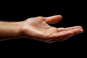 Open hand gesture against a textured dark background inviting interaction or assistance photo
