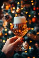Festive gathering captures a hand holding a cold beer with sparkling decorations in the background photo
