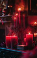 Elegant candle arrangement in dark red for a warm evening gathering ambiance photo