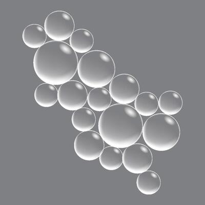 Soap bubbles, displaying unique designs, gracefully float on a plain gray surface