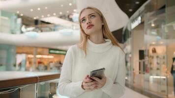 Sad Caucasian puzzled anxious female businesswoman 20s woman has problem with smartphone receive bad message on mobile phone low public internet connection upset dissatisfied girl lady express despair photo