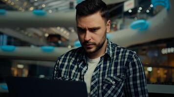 Disappointed depressed sad businessman freelancer caucasian man has problem with computer make mistake error send incorrect data read bad e-mail message upset male fail business deal bankruptcy defeat photo