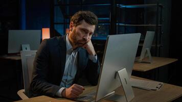 Bored exhausted Caucasian businessman ill sick middle-aged man tired lazy worker employee manager CEO agent engineer napping in evening office nighttime routine computer work sleeping overwork concept photo