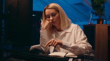 Tired lazy Caucasian businesswoman IT programmer typing keyboard code tech software sleepy exhausted female girl business woman sleep night home insomnia computer overwork yawn online crypto trading photo