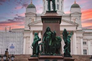 Helsinki Cathedral and Alexander II Statue at Sunset in Senate Square photo