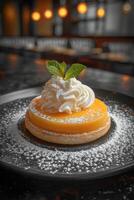 Lemon Tart Dessert with Whipped Cream and Mint photo
