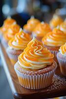 Closeup of a Delicious Orange-Glazed Cupcake photo