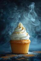 A Steamy, Delicious Cupcake With White Frosting photo