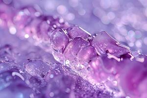 A close-up of translucent purple crystals glistening in water, creating an ethereal and calming atmosphere. photo