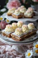 Close Up of Delicious Cheesecake Squares with Pink Flowers photo