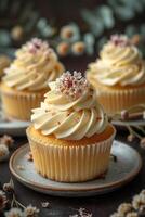 Vanilla Cupcake with Delicate Pink Flowers photo