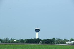 Kuala Namu airport control tower with sky background photo