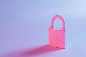 Close-up of a lockpad with shadow on studio blue background photo