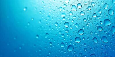 Close-Up of Water Droplets on a Smooth Blue Surface photo