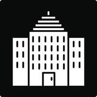 A white building icon on a black background vector