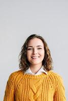 Cheerful Young Woman. Smiling, Positive, and Joyful. Happy Curly-haired Student Laughing, Looking at Camera. Isolated on White Background Close-Up Headshot Portrait for Product and Service Advertising photo