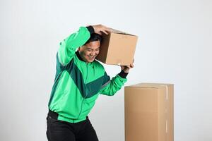 Online Motorcycle Driver Smiling While Driver Holding Carboard photo