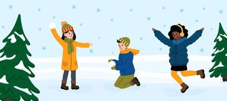 Children enjoying a snowy day while playing and creating snowballs in winter vector