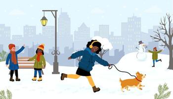 Children enjoy a snowy day while walking a dog and making a snowman in the city park vector