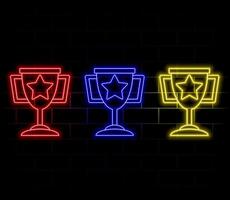 trophy icon in purple neon light with light particles surrounding icon vector