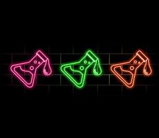 Glowing neon Test tube and flask chemical laboratory test icon isolated on brick wall background. Laboratory glassware sign. vector