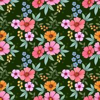 Beautiful blooming flowers design on green color background seamless pattern. vector