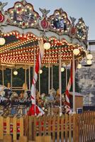 Vintage Carousel with Bright Lights and Detailed Decor photo