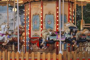 Vintage Carousel with Decorative Horses and Lights photo