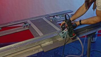 Close up of cutting narrow tiles of ceramic panel with circular saw and water. Creative. Industrial background with using of professional equipment. video