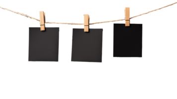 Black photo frames hanging on a string with transparent background png