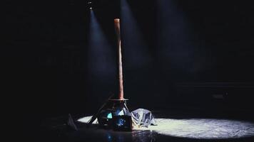 Dark empty stage with wooden pillar and tv monitor. Media. Preparation for the performance. video