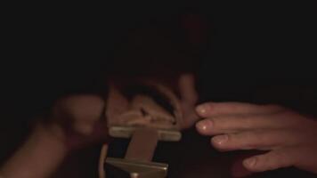 Close up of man taking big, sharp sword. Media. Armor for knights of medieval times. video