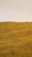 A rustic burlap isolated white background, perfect textured backdrop for showcasing vintage DIY craft products katalog, copy space photo