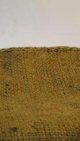 A rustic burlap isolated white background, perfect textured backdrop for showcasing vintage DIY craft products katalog, copy space photo