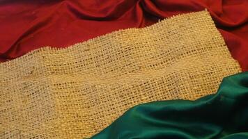 A rustic vintage burlap featuring green and red plain fabric, copy space for minimalist christmas greeting design textured background photo