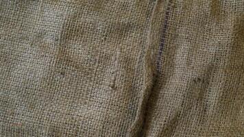 A rustic burlap isolated white background, perfect textured backdrop for showcasing vintage DIY craft products katalog, copy space photo