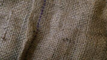 A rustic burlap isolated white background, perfect textured backdrop for showcasing vintage DIY craft products katalog, copy space photo