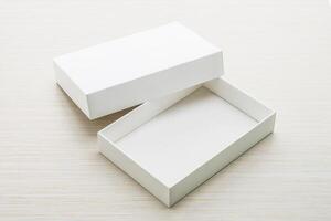 Open white box on wooden surface photo