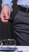 vertical Office worker showing his empty pockets after losing all his money, having financial problems and being fired after bankruptcy. Businessman showing empty pockets after bankruptcy video