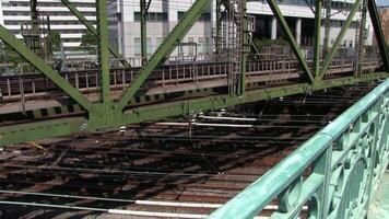 Moving train at the railway in Shinagawa Tokyo daytime video