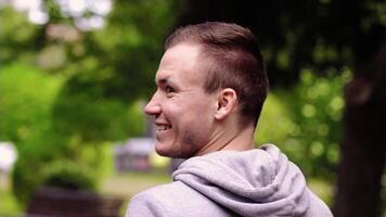 Talented actor shows different emotional grimaces in park video