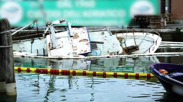 Old rusty sunken sailboat with damaged details in water video