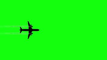 Silhouette of passenger airliner flying fast on chromakey video