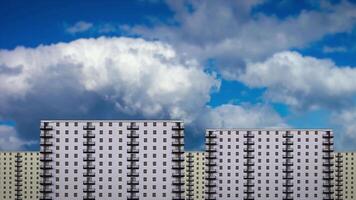Clouds float across sky above buildings on sunny day video